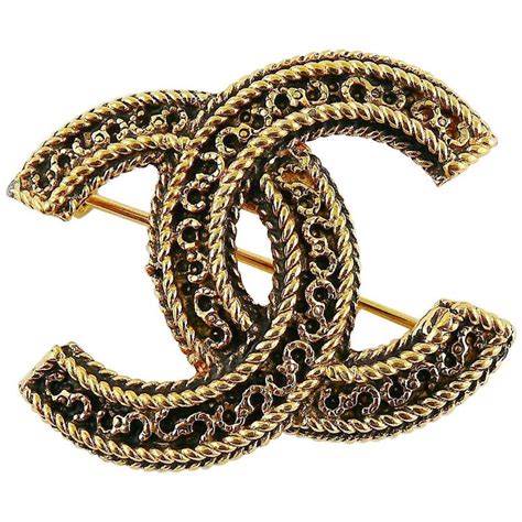 broche chanel argent|designer Chanel brooches uk.